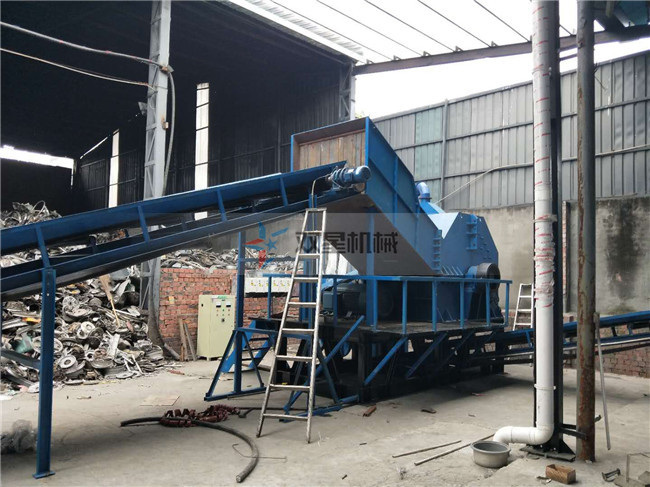 废钢粉碎机的处理粒度怎么调节